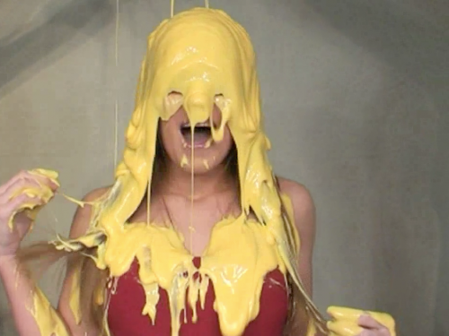 Amber with her hair completely coated in custard.