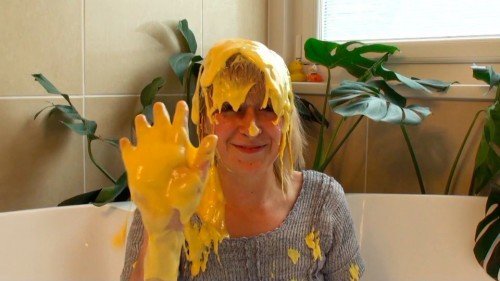Ellen is slimed with custard.