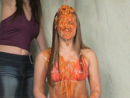 Girl covered in spaghetti