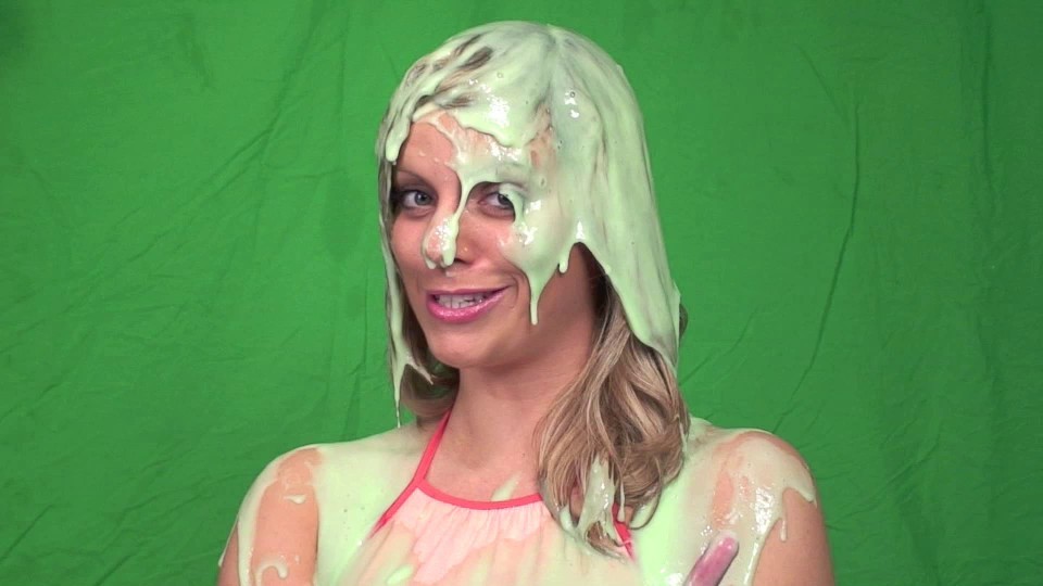 Girl slimed with cake batter on messy podcast.